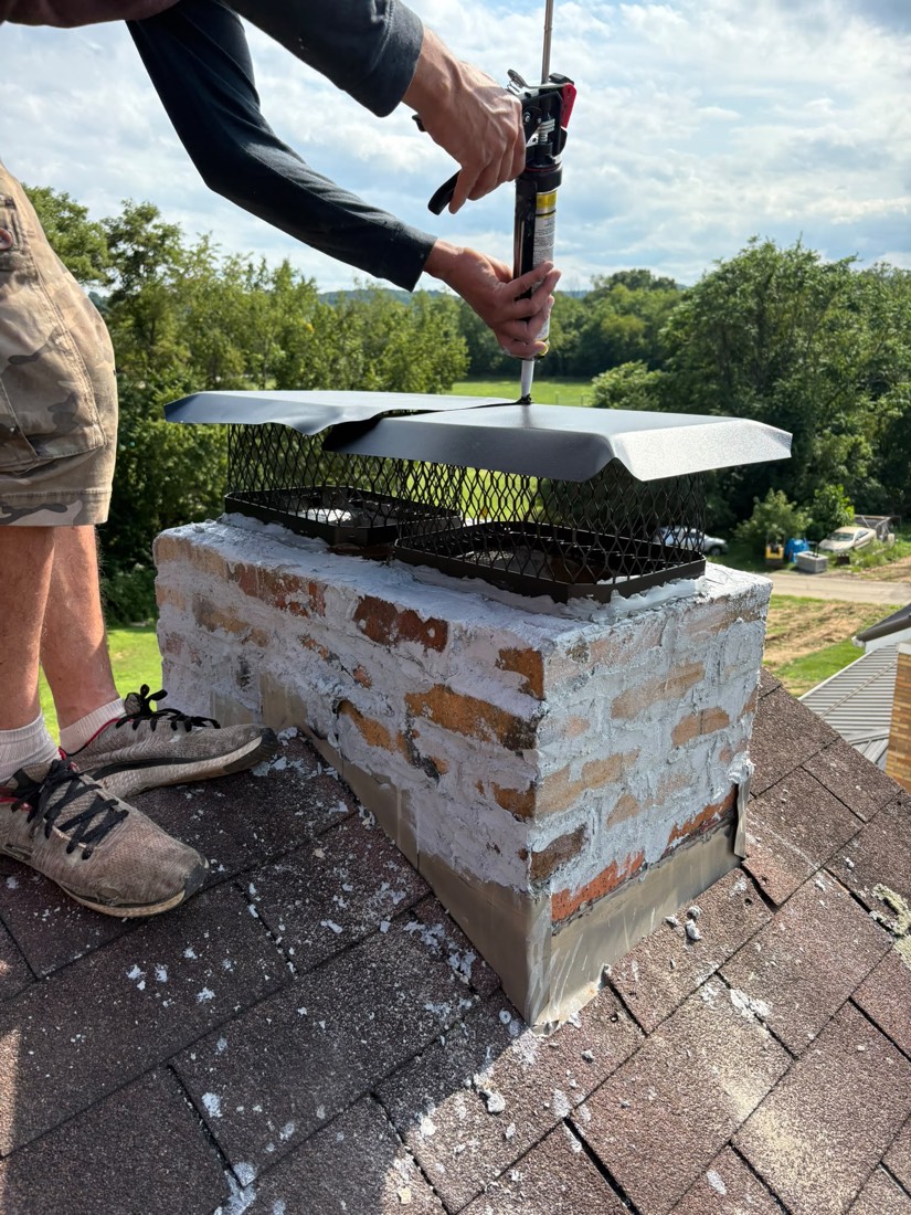 Same stack fully repointed and sealed with a new cap